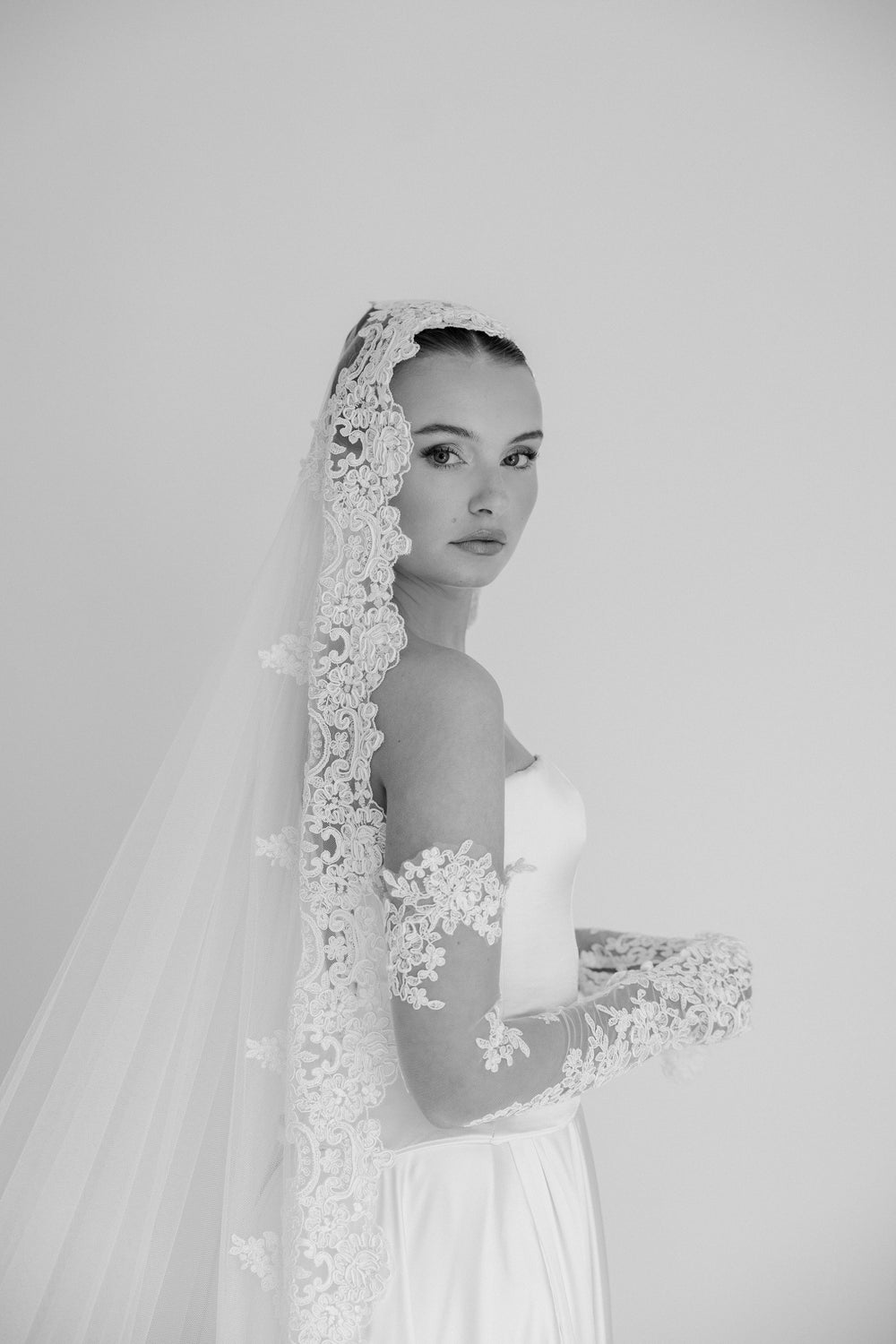 BILLIE. mantilla veil, bold lace edge.