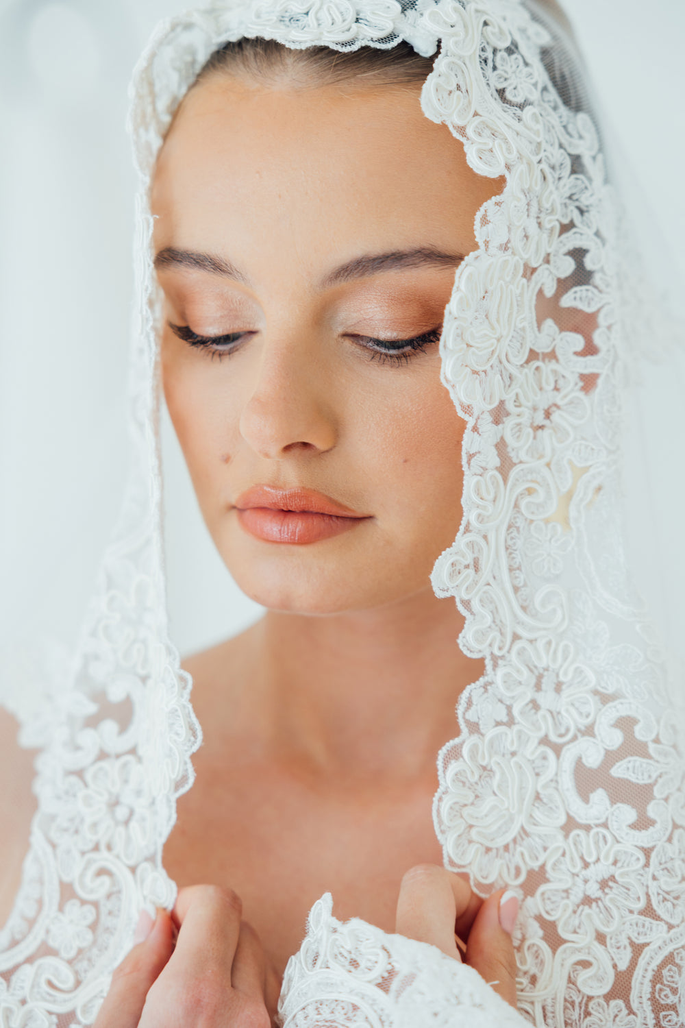 BILLIE. mantilla veil, bold lace edge.