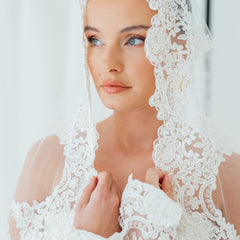 BILLIE. mantilla veil, bold lace edge.