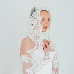 BILLIE. mantilla veil, bold lace edge.
