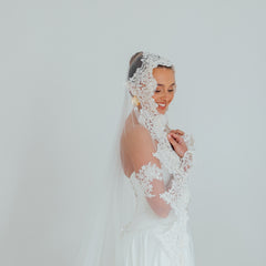 BILLIE. mantilla veil, bold lace edge.