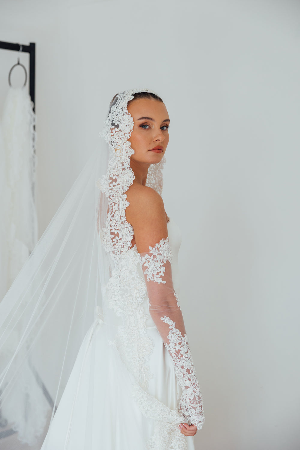 BILLIE. mantilla veil, bold lace edge.