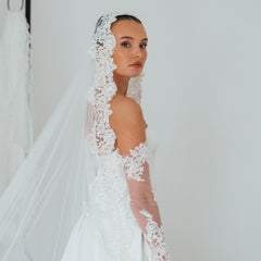 BILLIE. mantilla veil, bold lace edge.