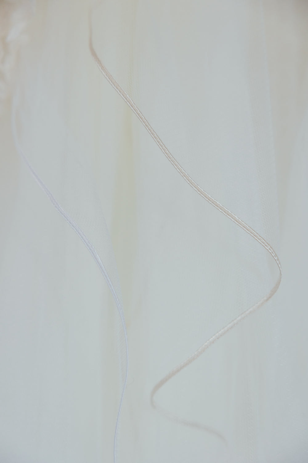 NATASHA. single tier veil, delicate cord trim.