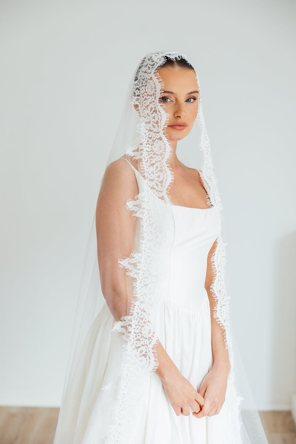 SOPHIE. mantilla veil, cord lace trim.