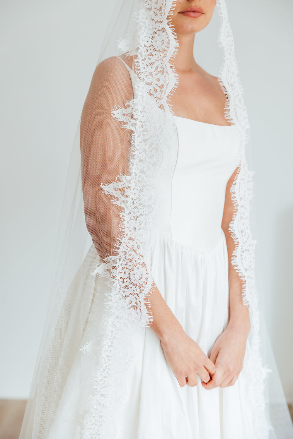 SOPHIE. mantilla veil, cord lace trim.